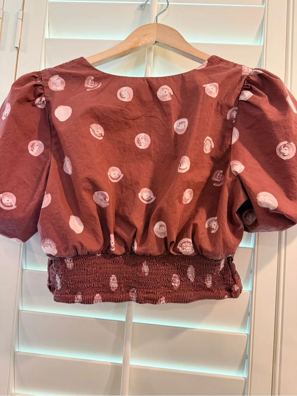Anthropologie rust brown cropped blouse with white dot print